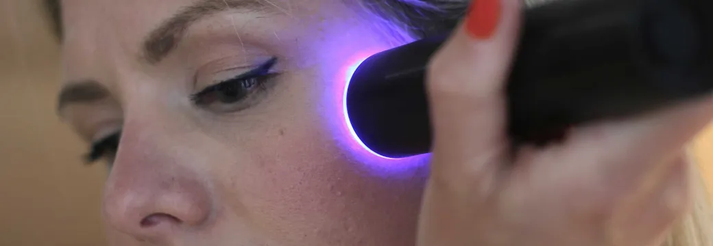 Hero Jess using laser under the eyes