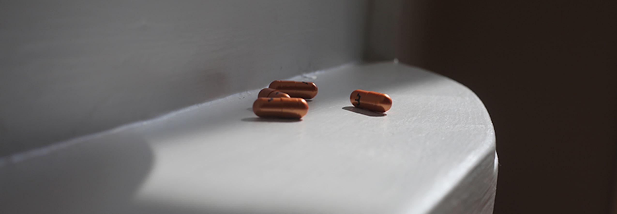 pills on ironing table