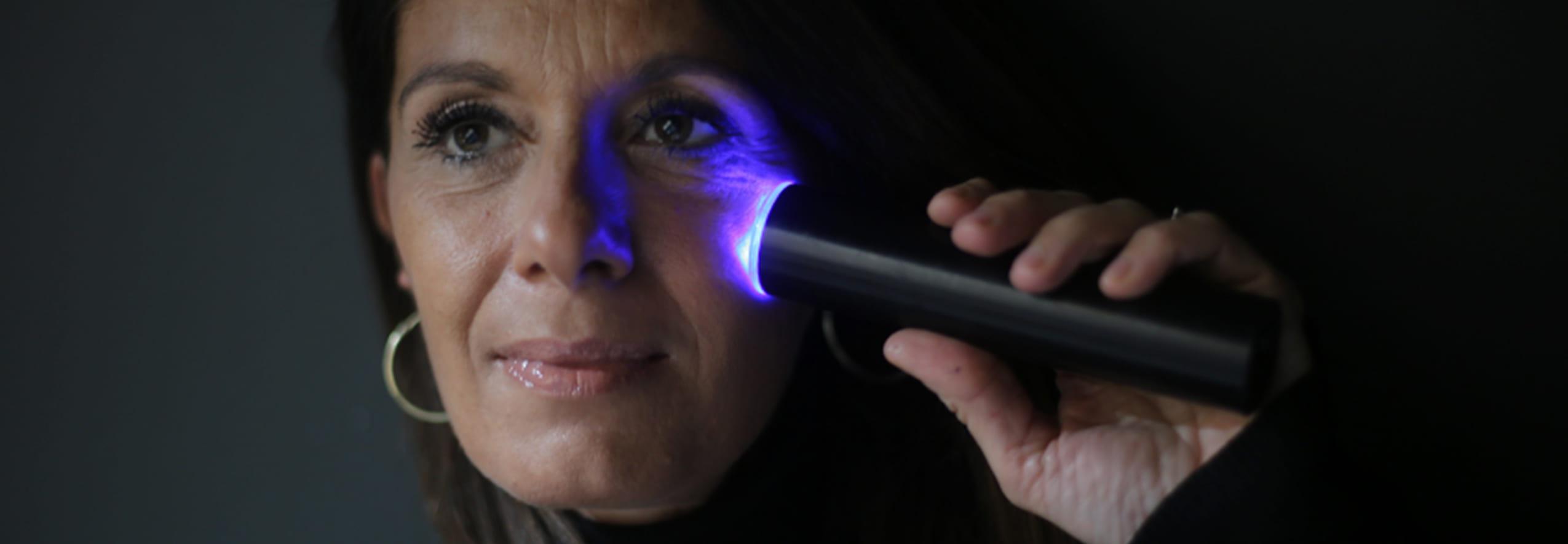 Woman uses laser