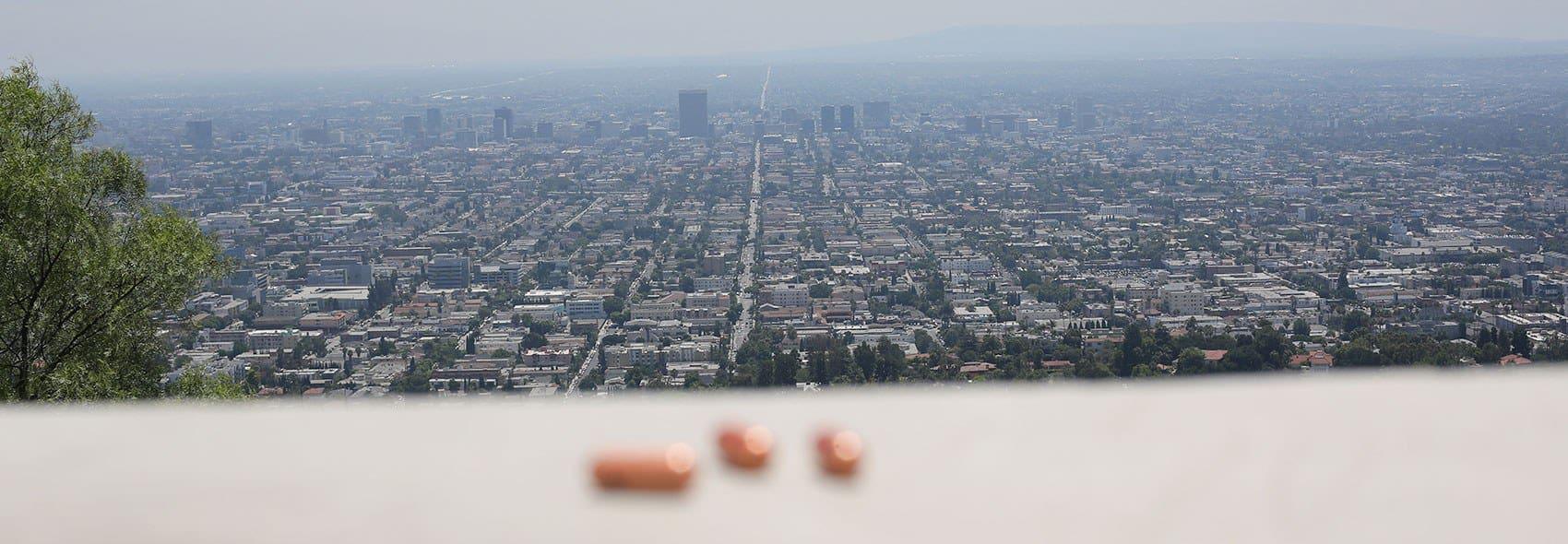 Vitamin d pills on balcony city landscape