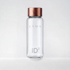 LYMA ID² Glass Vessel - A glass shaker bottle: pure, inert and built to preserve integrity. Hand-crafted using 100% purest grade copper lid, the identical material used for the LYMA Supplement Copper Vessel.
